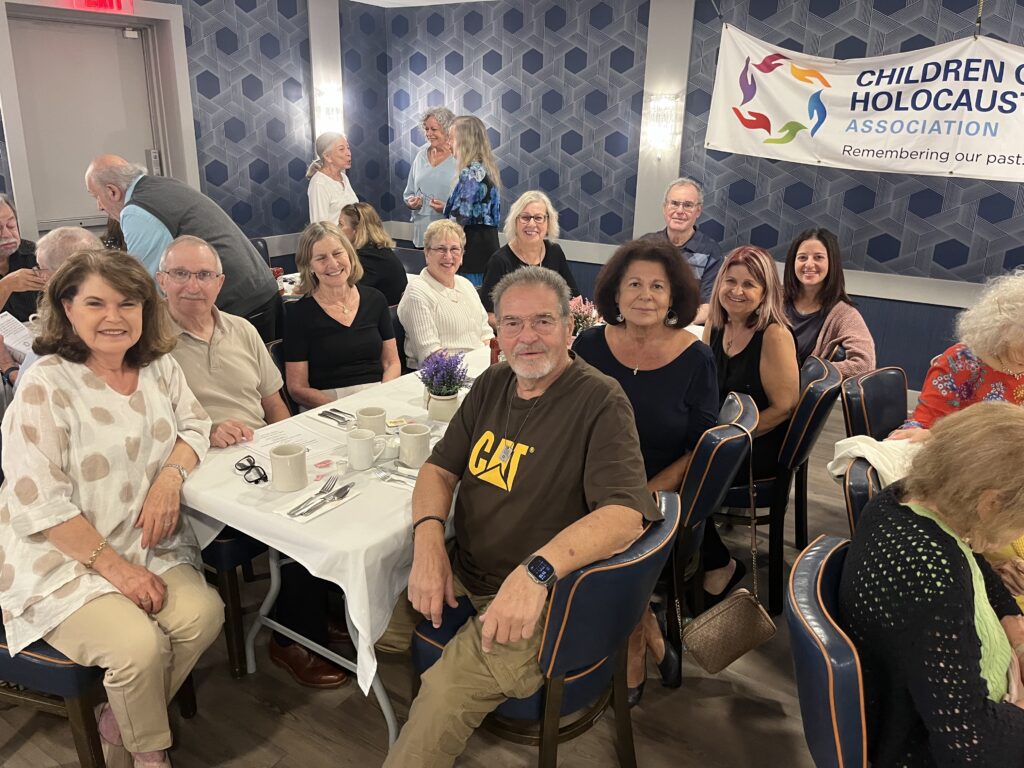 Informative outdoor exhibit panels discussing human rights, democracy, and totalitarianism.