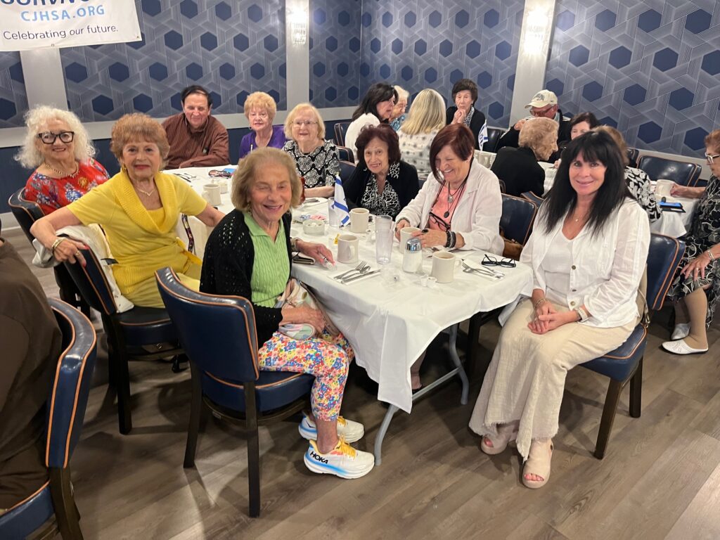 Informative outdoor exhibit panels discussing human rights, democracy, and totalitarianism.