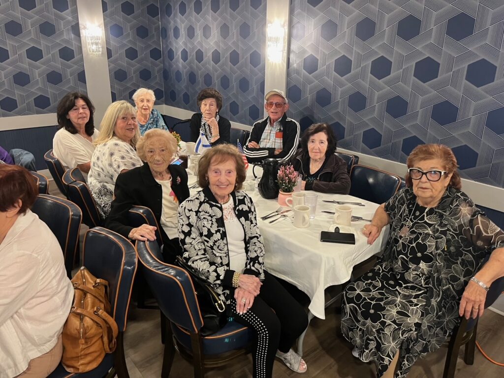 Informative outdoor exhibit panels discussing human rights, democracy, and totalitarianism.