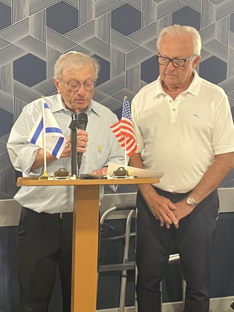 Informative outdoor exhibit panels discussing human rights, democracy, and totalitarianism.