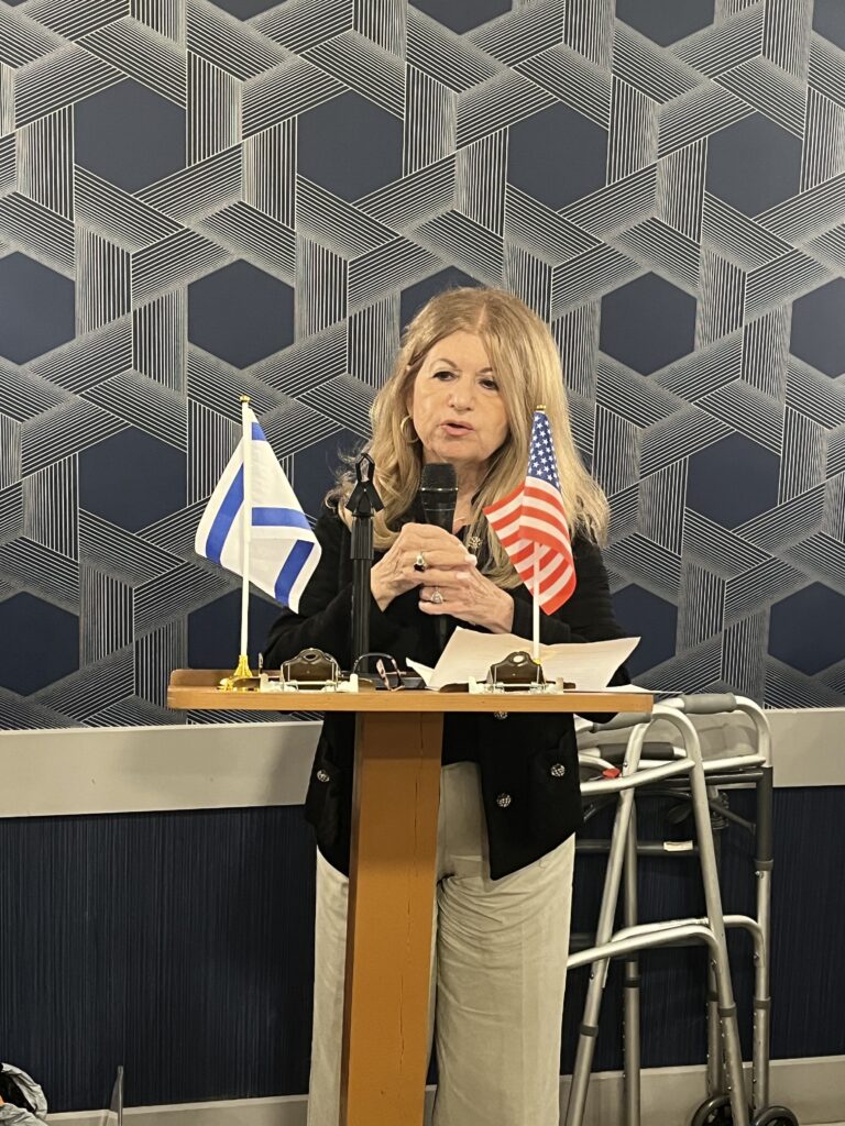 Informative outdoor exhibit panels discussing human rights, democracy, and totalitarianism.