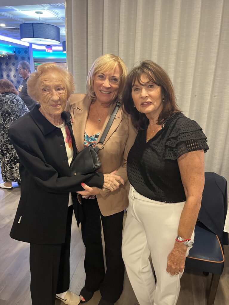 Informative outdoor exhibit panels discussing human rights, democracy, and totalitarianism.